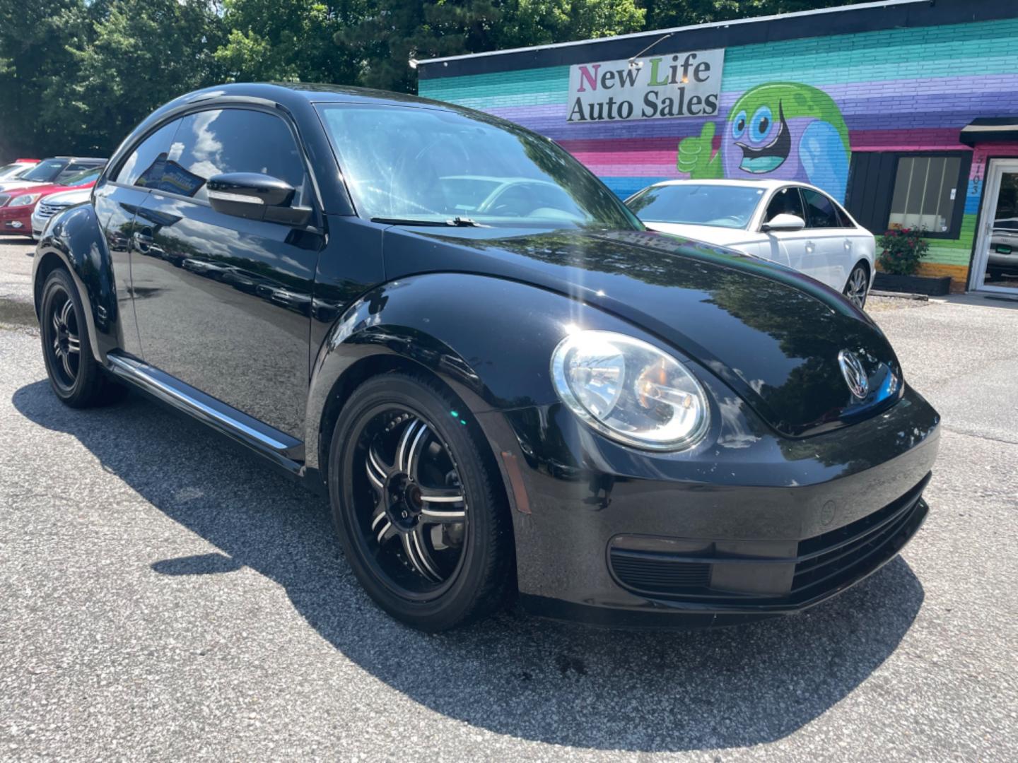 2012 BLACK VOLKSWAGEN BEETLE 2.5L PZEV (3VWJP7AT0CM) with an 2.5L engine, Automatic transmission, located at 5103 Dorchester Rd., Charleston, SC, 29418-5607, (843) 767-1122, 36.245171, -115.228050 - Local Trade-in with Leather, CD/AUX/Bluetooth, Hands-free Phone, Power Windows, Power Locks, Power Mirrors, All-weather Mats, Keyless Entry, Alloy Wheels. Clean CarFax (no accidents reported!) Only 68k miles! Located at New Life Auto Sales! 2023 WINNER for Post & Courier's Charleston's Choice Pre - Photo#0